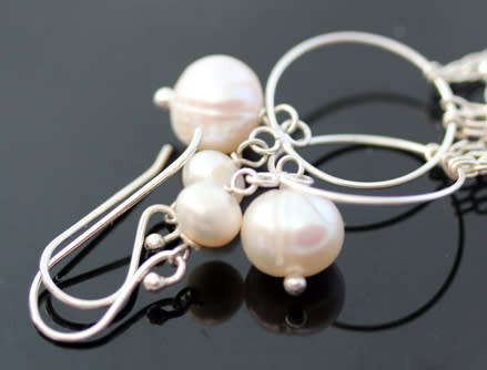 VERY LONG (80mm) WATERFALL CHAIN STERLING SILVER AND CREAMY BAROQUE PEARL DROP EARRINGS. 925