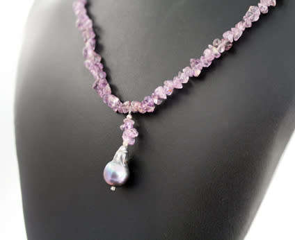 POLISHED NATURAL AMETHYST AND STERLING SILVER BEAD NECKLACE WITH BLACK BAROQUE PEARL PENDANT