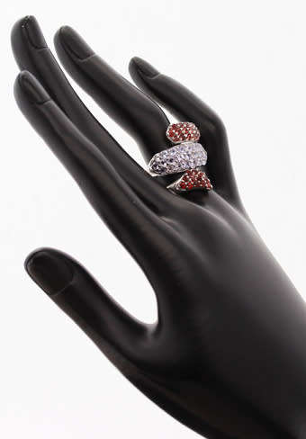 DRAMATIC TRIPLE CROSSOVER STERLING SILVER RING WITH BLUE TANZANITE AND MOZAMBICAN GARNETS. 925