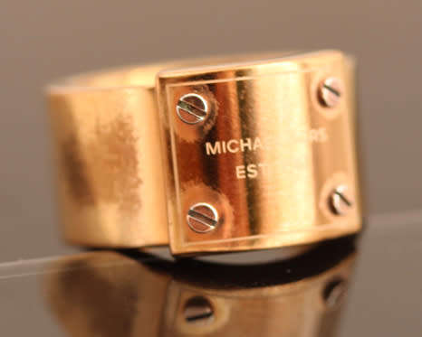 BOLD, REAL MICHAEL KORS BRAND UNUSUAL METAL RING. SIMPLE AVANT GARDE DESIGN. HEAVY!