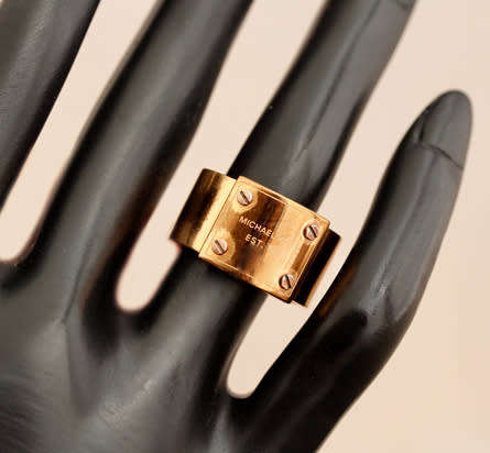 BOLD, REAL MICHAEL KORS BRAND UNUSUAL METAL RING. SIMPLE AVANT GARDE DESIGN. HEAVY!