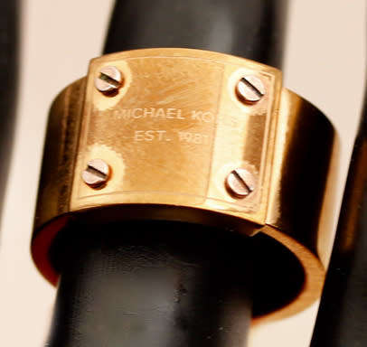 BOLD, REAL MICHAEL KORS BRAND UNUSUAL METAL RING. SIMPLE AVANT GARDE DESIGN. HEAVY!
