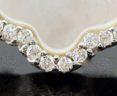 BEAUTIFUL MOTHER OF PEARL STERLING SILVER RING ACCENTED WITH CUBIC ZIRCONIA. 925