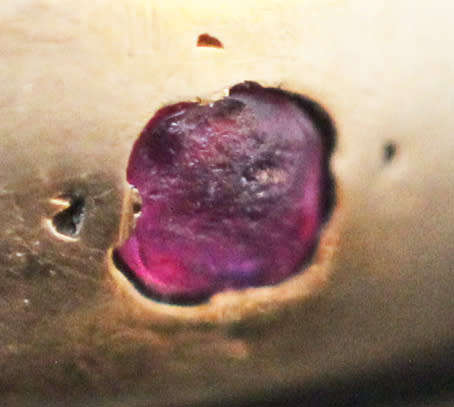 ANTIQUE ENGLISH 9CT GOLD BAND GYPSY SET RUBY AND STAR SET DIAMOND RING. circa early 1900's