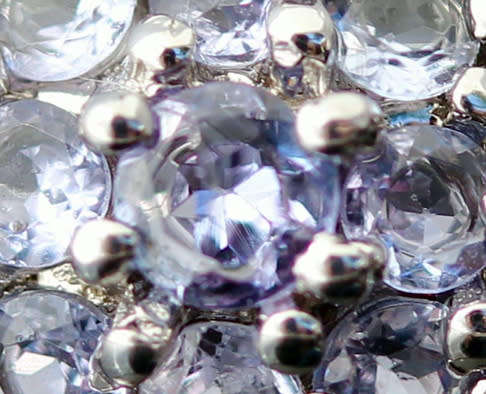 TANZANITE AND DIAMOND STERLING SILVER RING. 925