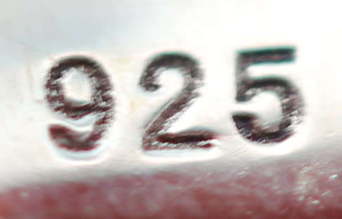 TANZANITE AND DIAMOND STERLING SILVER RING. 925