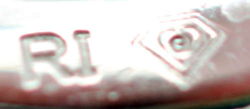 TANZANITE AND DIAMOND STERLING SILVER RING. 925