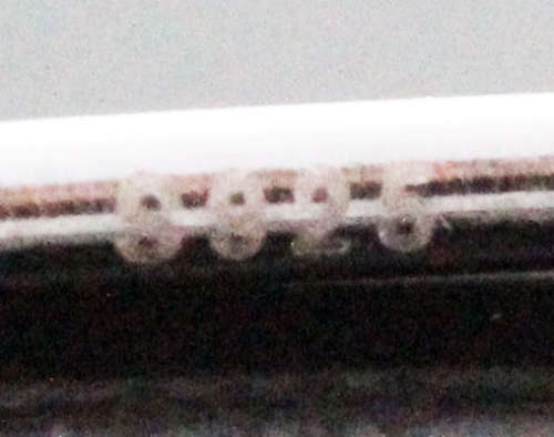 CONTEMPORARY EMERALD AND BRIGHT WHITE STONE STERLING SILVER BANGLE. 925