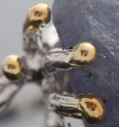 HUGE NATURAL EARTH-MINED ROUGH TANZANITE SET IN STERLING SILVER RING WITH GOLD HUED ACCENTS