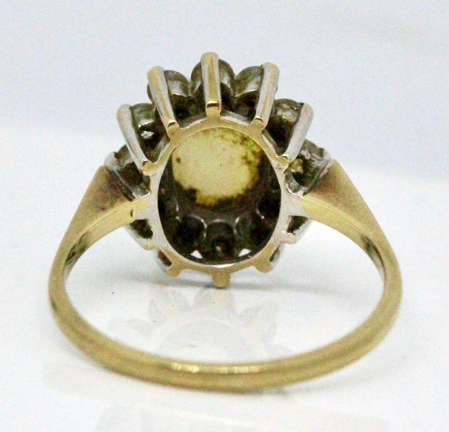 OPAL VINTAGE 9CT YELLOW AND WHITE GOLD RING WITH WHITE STONE ACCENTS. 375
