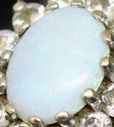 OPAL VINTAGE 9CT YELLOW AND WHITE GOLD RING WITH WHITE STONE ACCENTS. 375