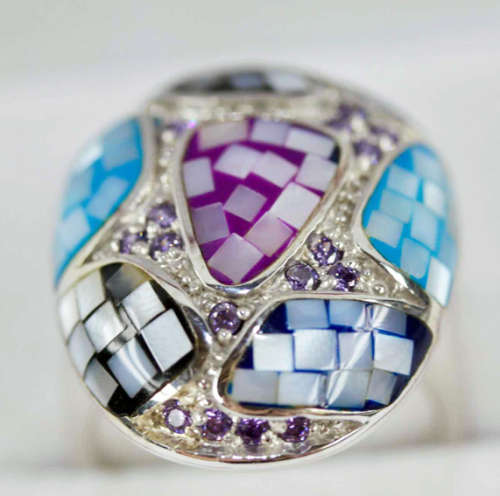 EYE-CATCHING LARGE DOMED REAL MOTHER OF PEARL STERLING SILVER RING. GORGEOUS COLOURS