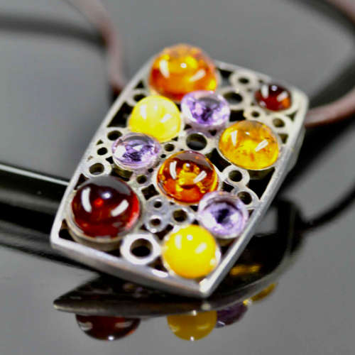 STRIKING LARGE VINTAGE SOLID STERLING SILVER PENDANT WITH  NATURAL AMBER & AMETHYST. LEATHER THONG