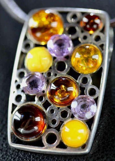 STRIKING LARGE VINTAGE SOLID STERLING SILVER PENDANT WITH  NATURAL AMBER & AMETHYST. LEATHER THONG