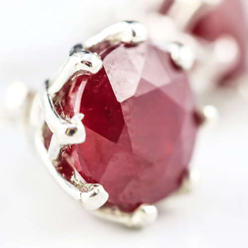 NATURAL RUBY LARGE STERLING SILVER STUD EARRINGS WITH FLORAL CLAW DETAIL. 925