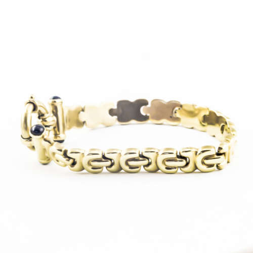 VINTAGE 9CT YELLOW GOLD GATE BRACELET WITH `SINORETTI` CLASP and ONYX. JEWELLER EVALUATION R20`000