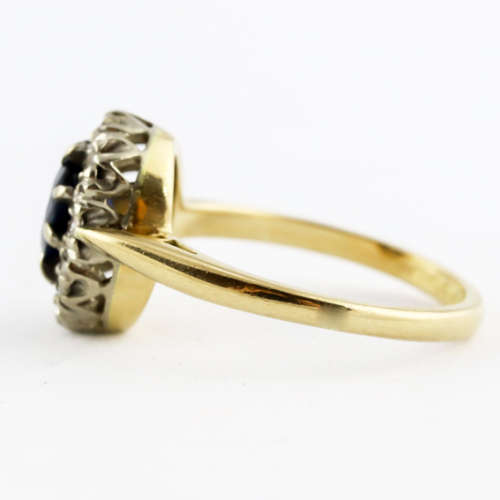 STRIKING VINTAGE DEEP BLUE SAPPHIRE AND DIAMOND 18CT YELLOW AND WHITE GOLD RING. INCL CERT R16`500