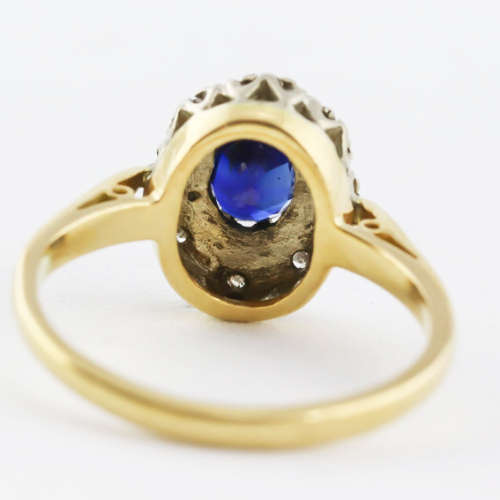 STRIKING VINTAGE DEEP BLUE SAPPHIRE AND DIAMOND 18CT YELLOW AND WHITE GOLD RING. INCL CERT R16`500