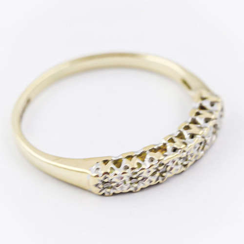 SLENDER DIAMOND HALF ETERNITY 9CT YELLOW AND WHITE GOLD RING. 375. `ILLUSION` SETTING