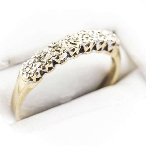 SLENDER DIAMOND HALF ETERNITY 9CT YELLOW AND WHITE GOLD RING. 375. `ILLUSION` SETTING