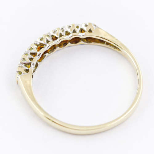 SLENDER DIAMOND HALF ETERNITY 9CT YELLOW AND WHITE GOLD RING. 375. `ILLUSION` SETTING