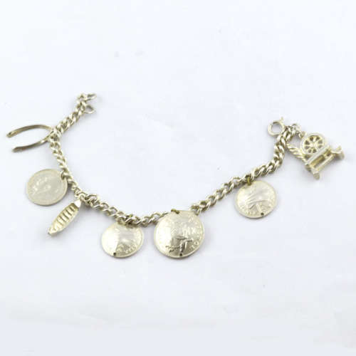 HEAVY VINTAGE HANDCRAFTED SOLID STERLING SILVER CHARM BRACELET WITH 7 CHARMS