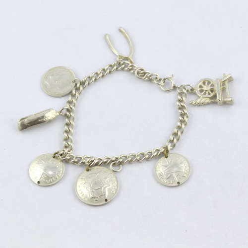 HEAVY VINTAGE HANDCRAFTED SOLID STERLING SILVER CHARM BRACELET WITH 7 CHARMS