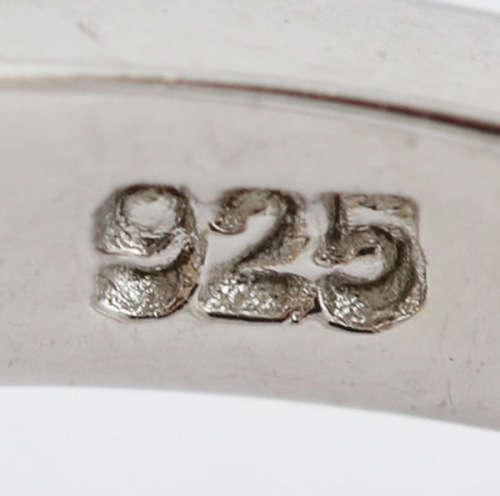 CONTEMPORARY DESIGN STERLING SILVER RING - OVAL CITRINE SOLITAIRE WITH CUBIC ZIRCONIA HALO. 925