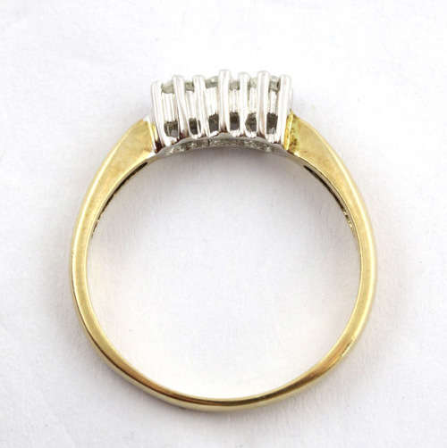DIAMOND TRILOGY 9CT YELLOW AND WHITE GOLD RING. 375. *JEWELLER`S EVALUATION R18`000*