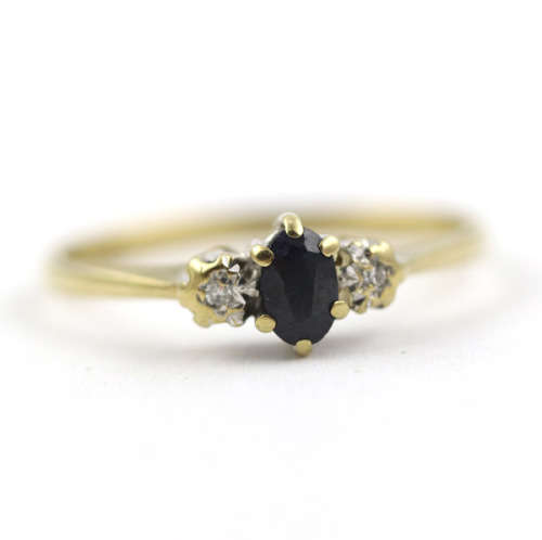 DAINTY OVAL SAPPHIRE AND DIAMOND 9CT YELLOW AND WHITE GOLD RING. * JEWELLER EVALUATION R12`000 *