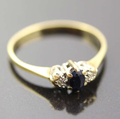 DAINTY OVAL SAPPHIRE AND DIAMOND 9CT YELLOW AND WHITE GOLD RING. * JEWELLER EVALUATION R12`000 *