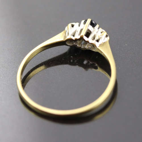 DAINTY OVAL SAPPHIRE AND DIAMOND 9CT YELLOW AND WHITE GOLD RING. * JEWELLER EVALUATION R12`000 *