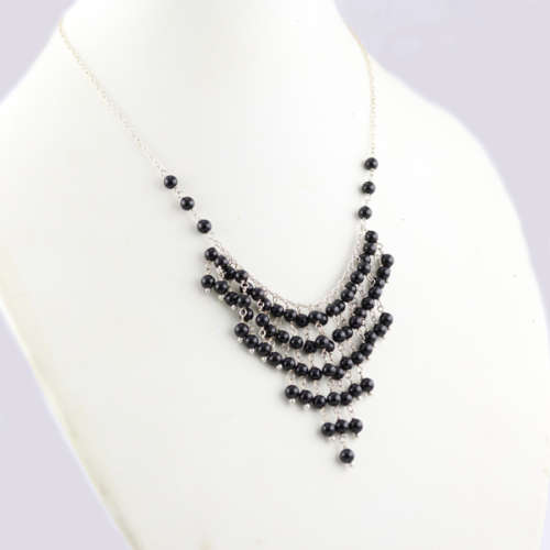 UNUSUAL STERLING SILVER FRINGE NECKLACE WITH A CASCADE OF 4MM ROUND BLACK SPINEL GEMSTONES. 925