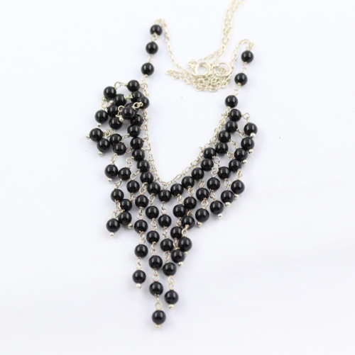 UNUSUAL STERLING SILVER FRINGE NECKLACE WITH A CASCADE OF 4MM ROUND BLACK SPINEL GEMSTONES. 925