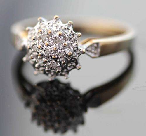 DIAMOND RING (0.05 carats) FROM SHEFFIELD, ENGLAND. YELLOW & WHITE GOLD. CLASSIC CLUSTER DESIGN!