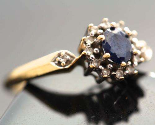 VINTAGE DARK BLUE SAPPHIRE AND DIAMOND RING. 9ct GOLD.