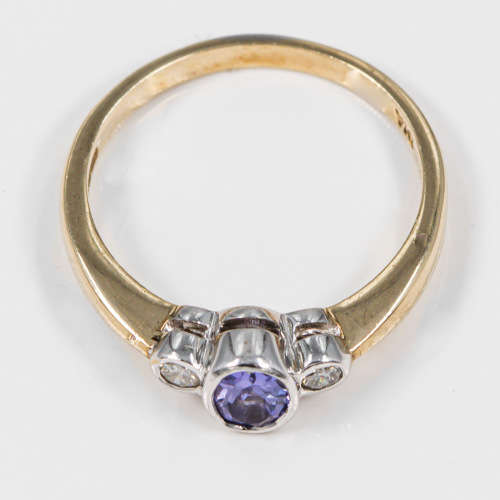 CONTEMPORARY DESIGN TANZANITE AND DIAMOND 9CT YELLOW and WHITE GOLD RING VALUATION CERT R18`000