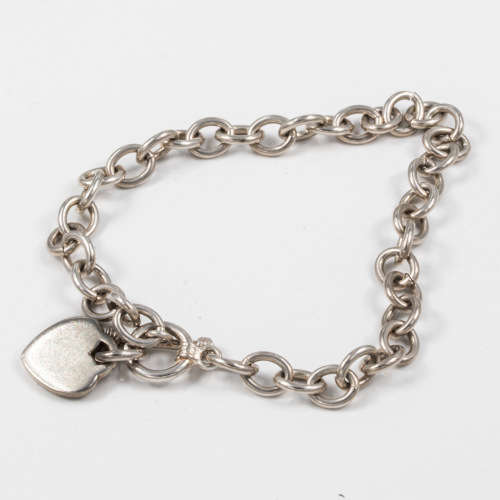 COLLECTABLE VINTAGE HEAVY SOLID STERLING SILVER BRACELET WITH TOGGLE CLOSURE AND HEART TAG