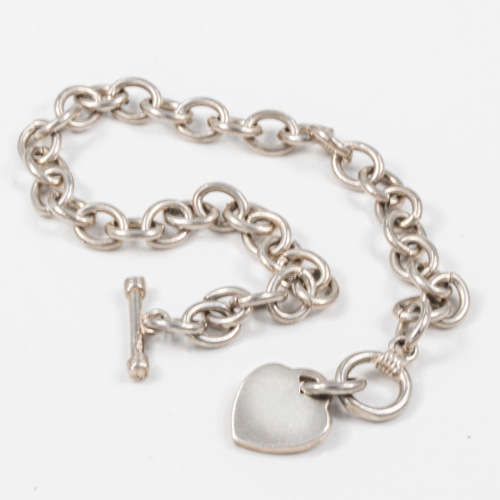 COLLECTABLE VINTAGE HEAVY SOLID STERLING SILVER BRACELET WITH TOGGLE CLOSURE AND HEART TAG