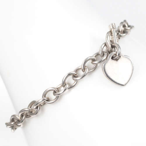 COLLECTABLE VINTAGE HEAVY SOLID STERLING SILVER BRACELET WITH TOGGLE CLOSURE AND HEART TAG