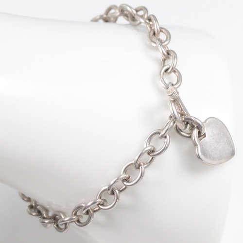 COLLECTABLE VINTAGE HEAVY SOLID STERLING SILVER BRACELET WITH TOGGLE CLOSURE AND HEART TAG