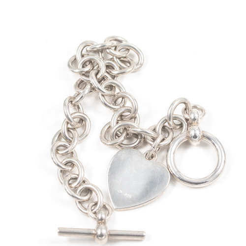 COLLECTABLE VINTAGE HEAVY SOLID STERLING SILVER BRACELET WITH TOGGLE CLOSURE AND HEART TAG