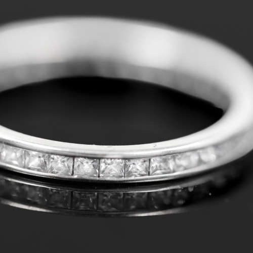 9ct  WHITE GOLD CHANNEL SET CUBIC ZIRCONIA ETERNITY RING. LONDON, ENGLAND HALLMARKED