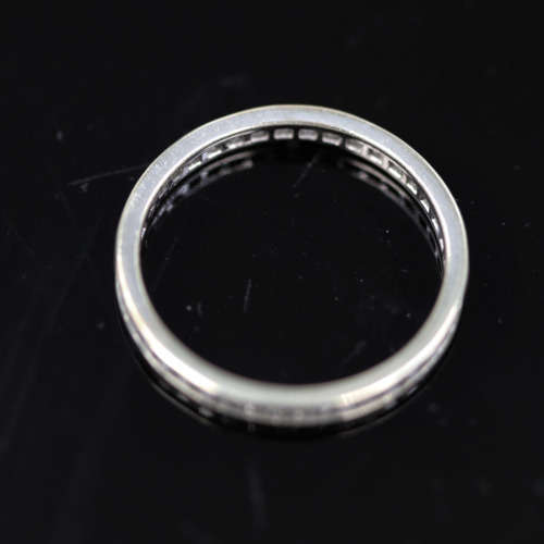 9ct  WHITE GOLD CHANNEL SET CUBIC ZIRCONIA ETERNITY RING. LONDON, ENGLAND HALLMARKED