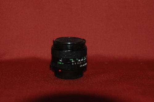 Canon FD 28mm lens 1:2.8, with front and rear dust caps. V Gd cond