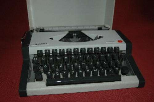 Olympia portable typewriter. VVgd cond.