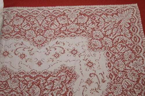 White terylene lace tablecloth 1.25m x 1.80m, drip-dry and non-iron, never used.