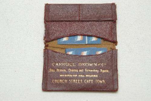 A small worn leather ticket and stamp wallet.  Carroll, Brown & Co, Church St, CT