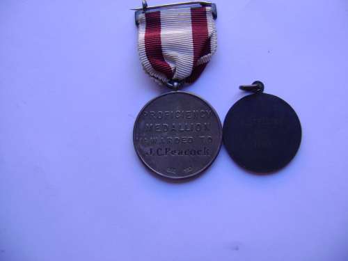 Red Cross Proficiency sIlver medal and a Royal Life Saving Bronze medallion.