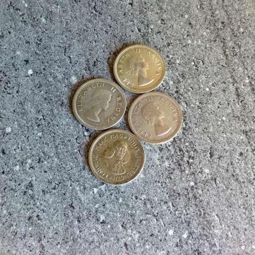 1962,1958,1958, and a 1958 SA 1 SHILLING SILVER COINS. BID 1 FOR 4.